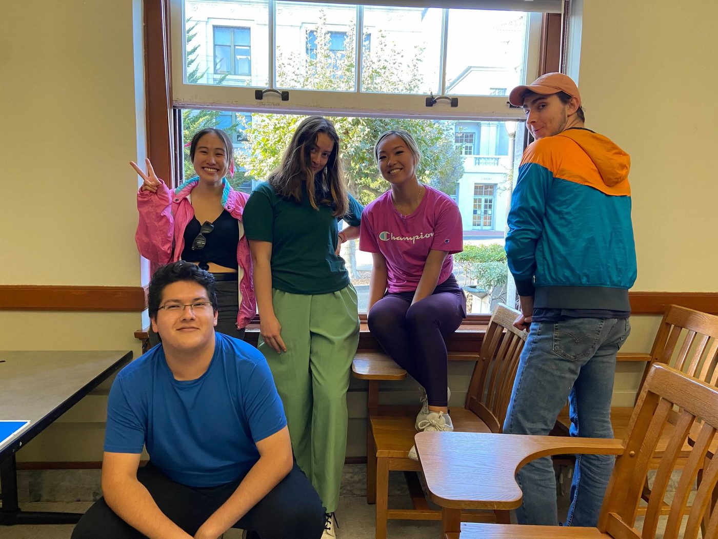 A group of members posing together indoors.